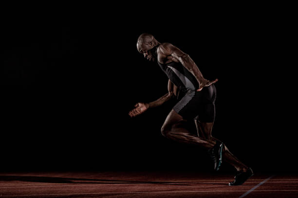 istock Side view of an African American runner 690651388