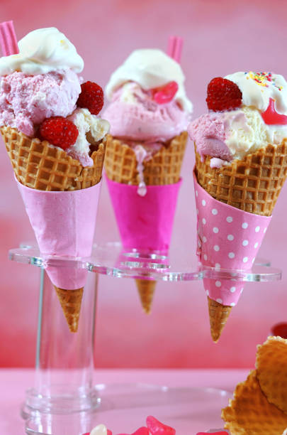 istock Summertime pink ice cream cones 690672396