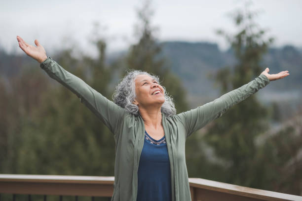 istock Hawaiian woman doing yoga pose outside 690675754