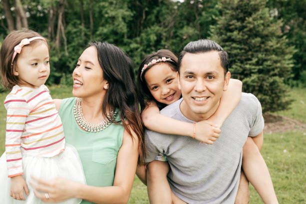 istock Happy family having fun outdoor 690675882