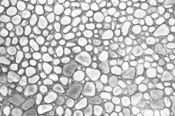 istock white wall of small stones, background light interior 690690104