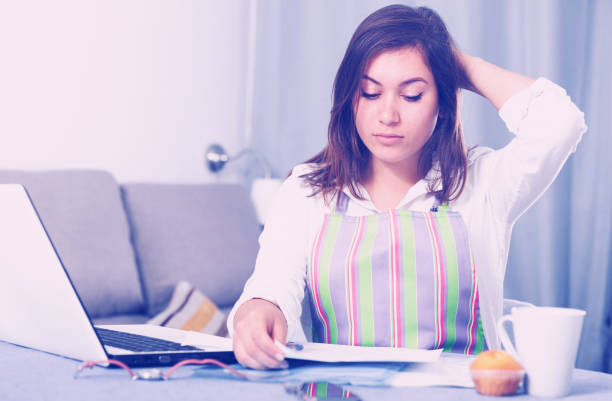 istock Housewife searching for recipes 690716720