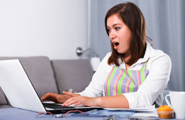 istock Housewife searching for recipes 690716728