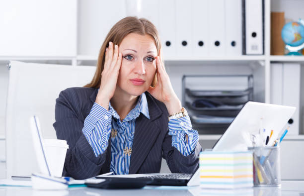 istock Frustrated business woman in office 690716812