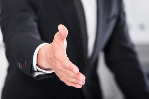 Photo of Businessmen ready to handshake