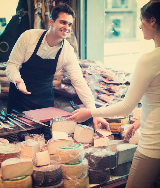 istock Customer buying cheese for dessert 690721758