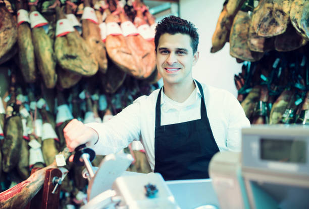 istock Seller in delicatessen section 690721776