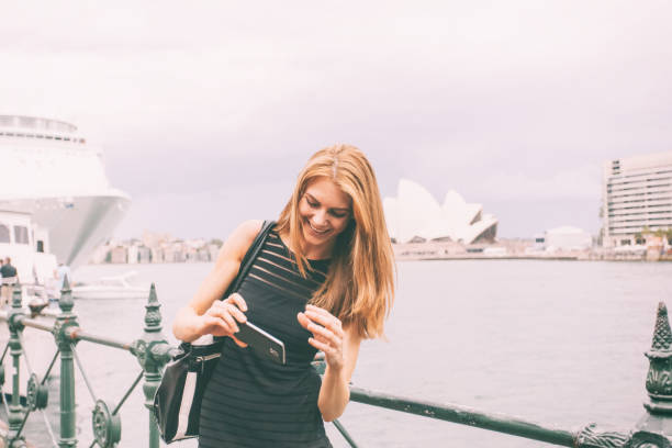 istock woman touring Sydney 690727286