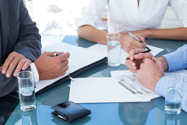 istock Business people in discussion in an office 690730420
