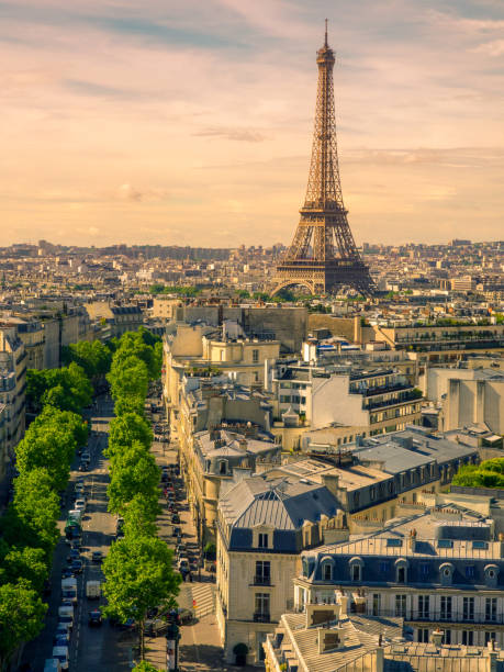 istock Paris cityscape with Eiffel tower in twilight. view of Eiffel tower from Are de Triomphe 690747796