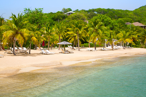 Antigua, Caribbean islands, English Harbour - May 20, 2017: Beach beds on the Galleon beach