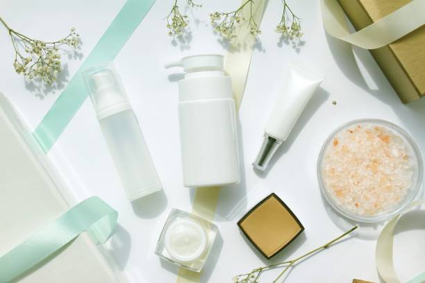 istock Cosmetic bottle containers with ribbon and gift boxes, Blank label for branding mock-up, Gift set bottles for sale promotion festival. 690761496