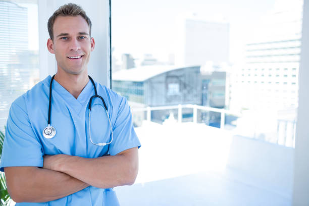 istock Smiling doctor looking at the camera 690764186