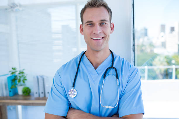 istock Smiling doctor looking at the camera 690764204