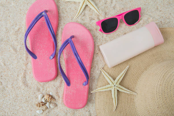 istock Sandal and beach item on sand 690774958