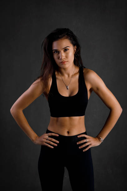istock Young female fitness model 690780788