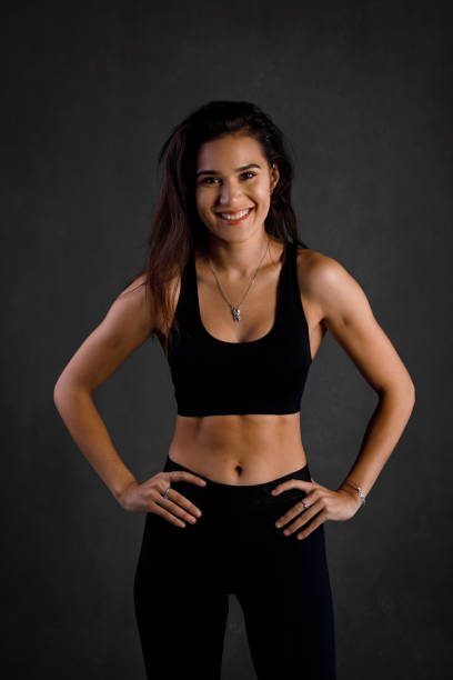 istock Young female fitness model 690780808