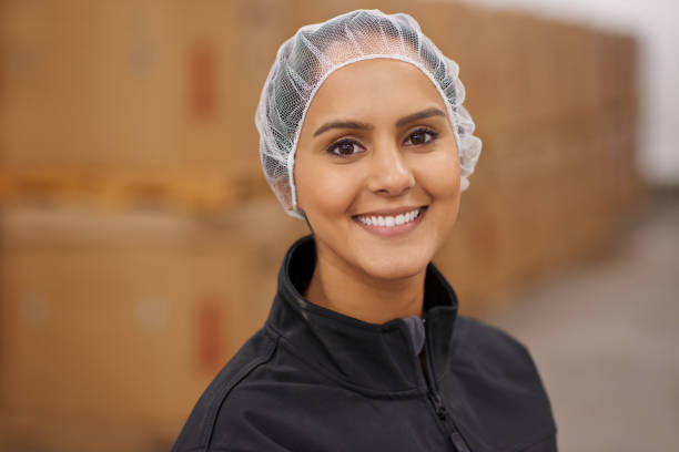 istock She's got a smile that can light up a storeroom 690781546