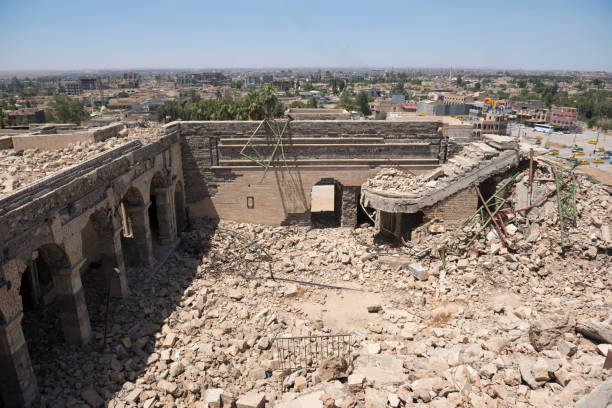 Ruins of Nabi Yunus shrine in Mosul, Iraq The ruins of the Nabi Yunus (Prophet Jonah) shrine in Mosul, Iraq, seen in May 2017. The so-called Islamic State blew up the shrine, believed to be the burial place of the prophet Jonah (Yunus), in 2014. militant groups stock pictures, royalty-free photos & images