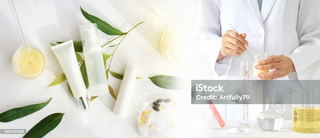 Natural beauty product concept, Doctor and medicine experiments, Pharmacist formulating the chemical for cosmetic, Cosmetic bottle containers, Blank label for branding mock-up. Laboratory Stock Photo