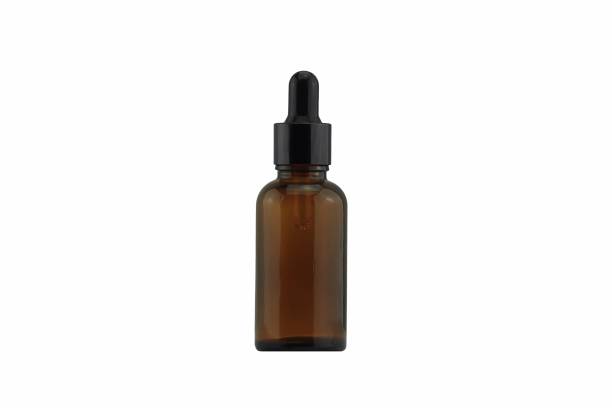 istock Cosmetic brown bottle dropper container isolated on white background, Blank label for branding mock-up. 690787262