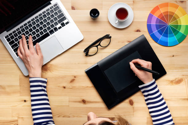 istock On top view of designer's working table 690793000