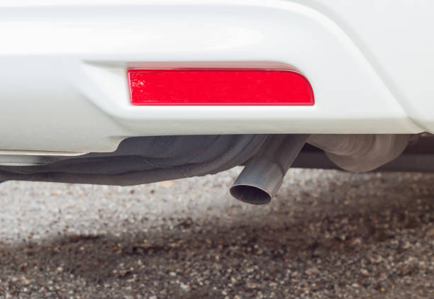 istock close-up exhaust pipe of a eco car. 690793140