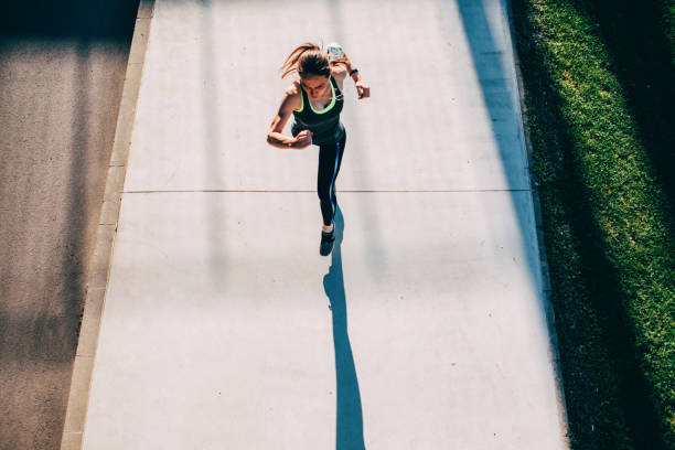istock Woman jogging in the city 690812982