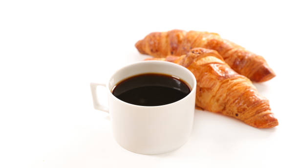 istock breakfast with coffee and croissant 690816222