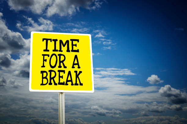 Time for a break road sign with cloud background Time for a break road sign with cloud background city break photos stock pictures, royalty-free photos & images