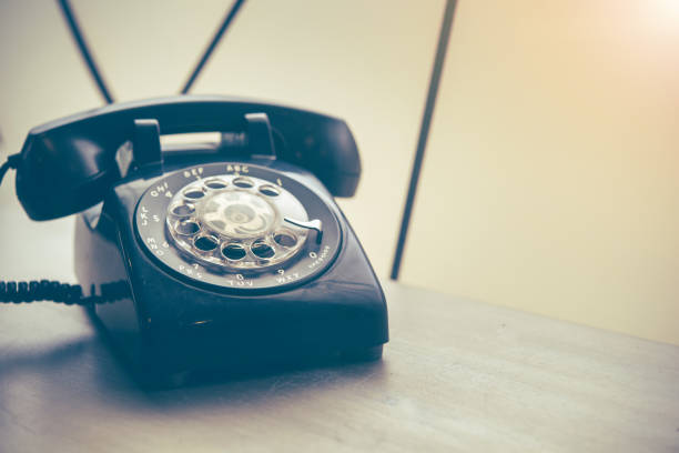istock Old black phone with dust and scratches 690826124
