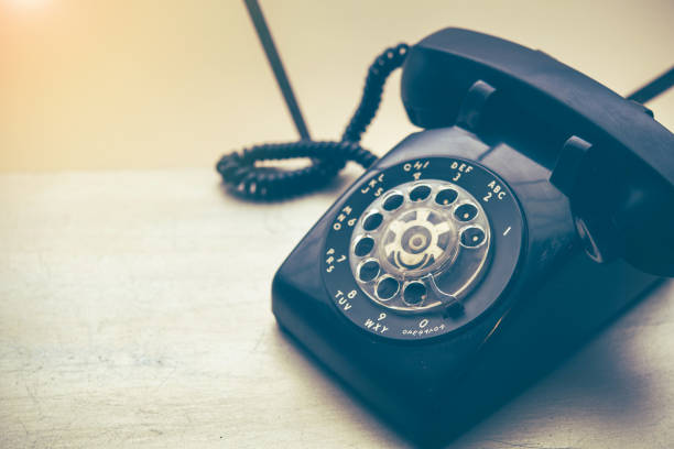 istock Old black phone with dust and scratches 690826128