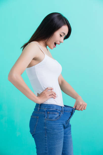 istock woman weight loss concept 690826334