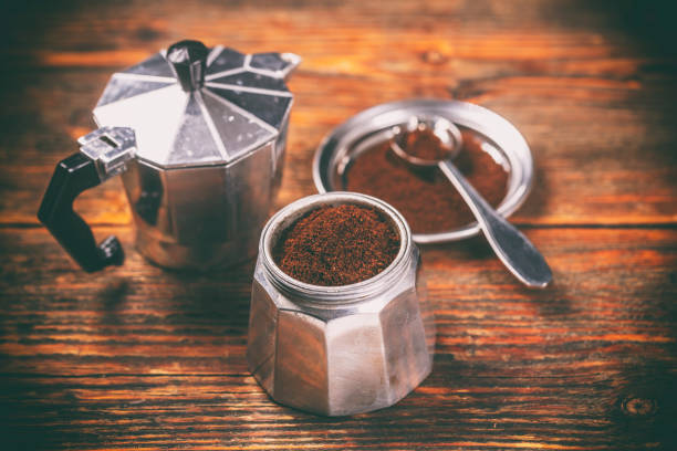 istock Ground coffee and moka pot 690829018