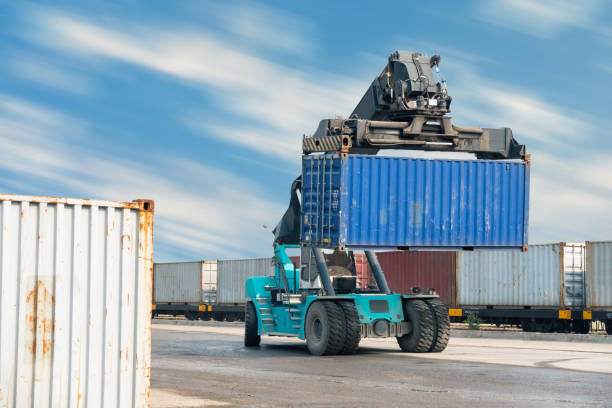 istock Container lifting truck in the storage yard. 690829414