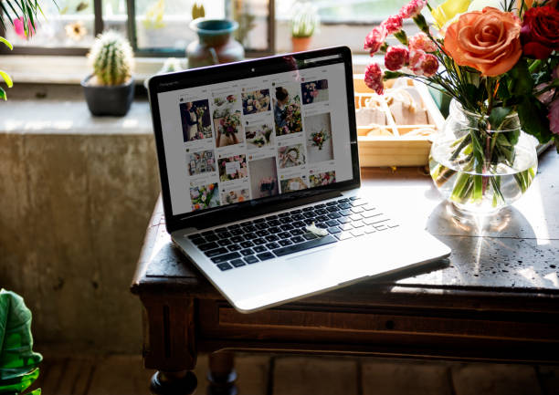 Laptop on the table about flower shop e-business