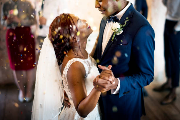 istock Newlywed African Descent Couple Dancing Wedding Celebration 690832776