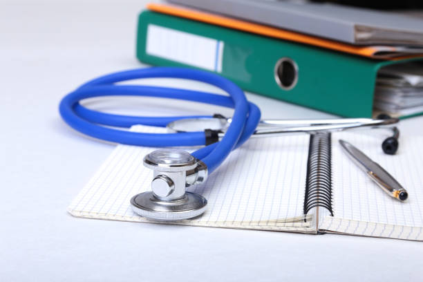 istock Folder file, stethoscope and RX prescription on the desk. blurred background. 690833696