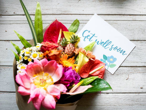 Get well soon message with bouquet Get well soon message with bouquet get well soon stock pictures, royalty-free photos & images