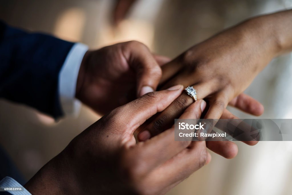 Groom Put on Wedding Ring Bride Hand Wedding Stock Photo
