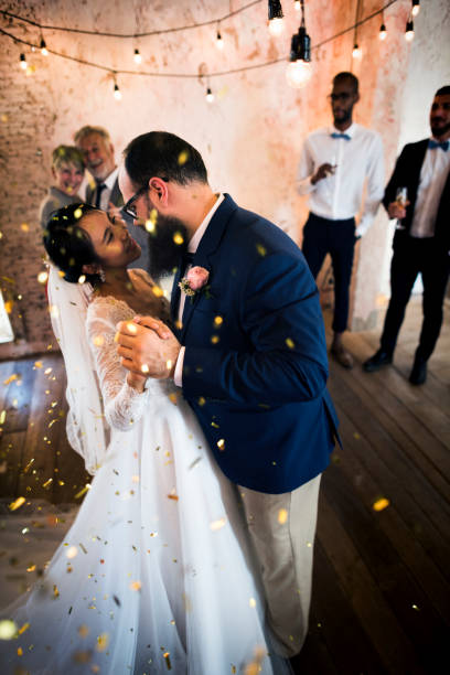 istock Newlywed couple dancing celebration party 690837210