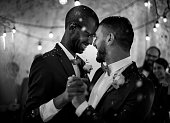Newlywed Gay Couple Dancing on Wedding Celebration