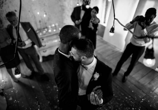 istock Newlywed Gay Couple Dancing on Wedding Celebration 690837648