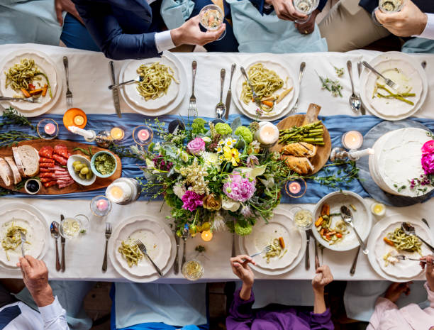 Diverse friends having food and drink