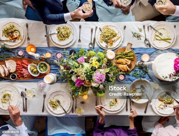 Diverse Friends Having Food And Drink Stock Photo - Download Image Now - Wedding, Food, Table