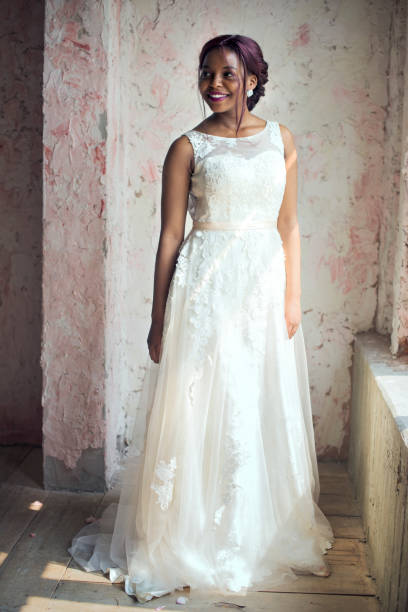 istock African Descent Bride in White Wedding Dress Cheerful 690838472