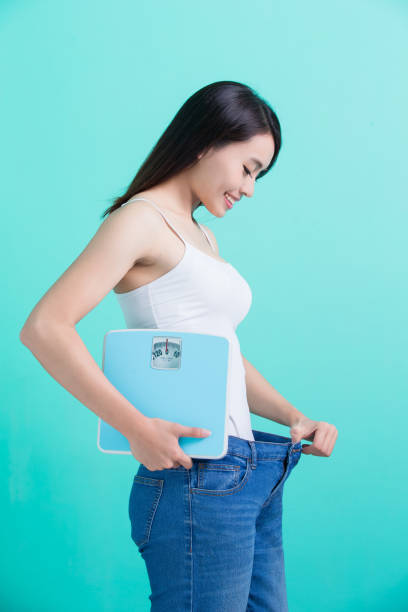 istock woman weight loss concept 690841192