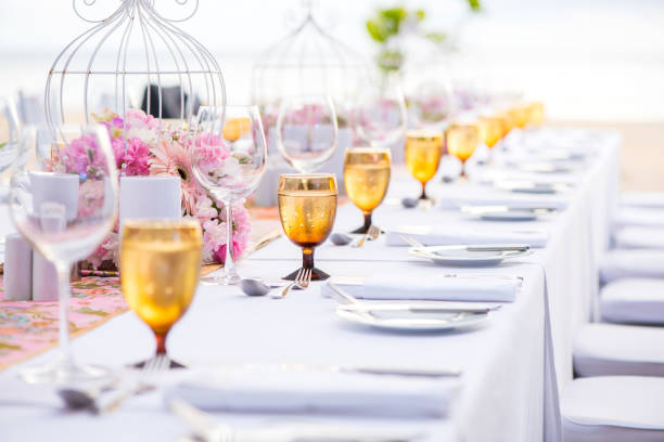 istock Table setting at a luxury wedding and Beautiful flowers on the table. 690841302