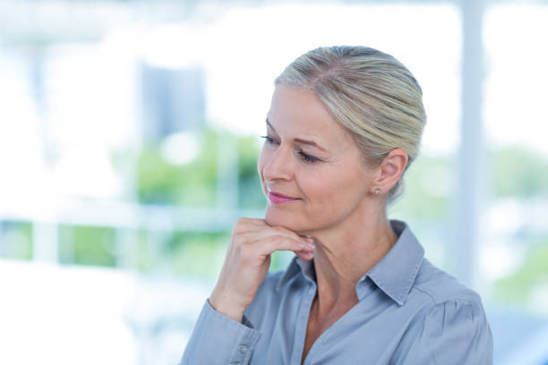 istock Thoughtful businesswoman looking away 690841736