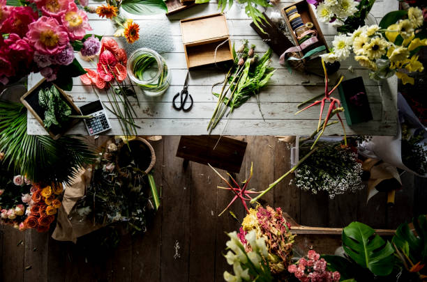 istock Flower arrangement on a wooden table 690842342